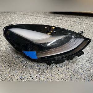 Tesla headlight passenger side